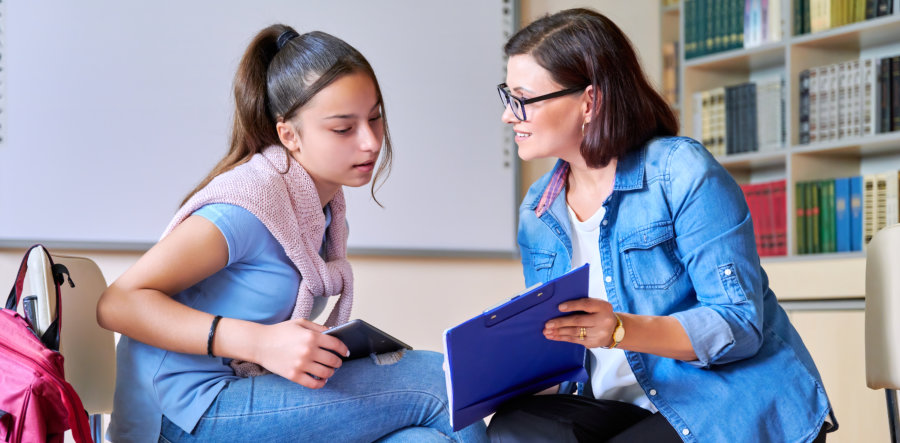 psychologist talking to a teenager