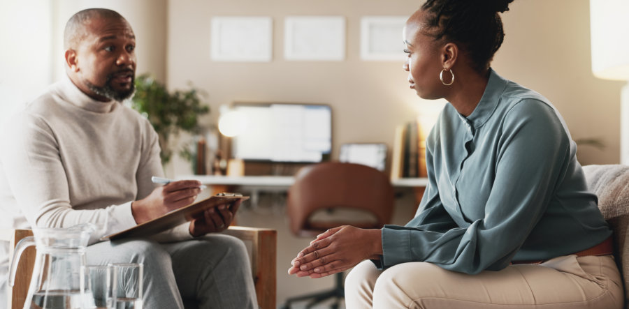 female patient talking to psychologist