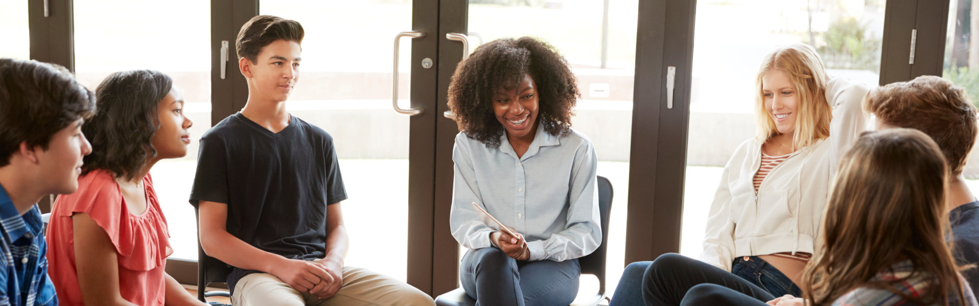group of people in a therapy session